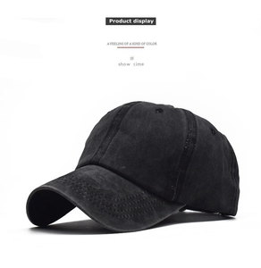 Detail view of washed cotton baseball cap with 6-panel structure and curved brim