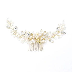Elegant bridal hair comb with gold wires, pearls, and rhinestones for wedding hairstyles