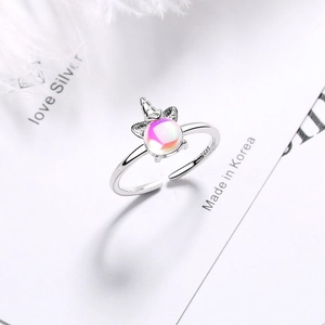 S925 sterling silver unicorn open ring with moonstone gemstone on white background