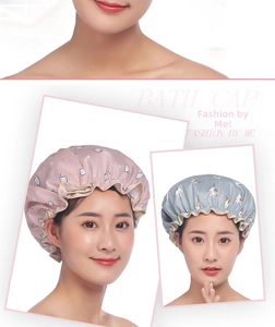 Detail of waterproof double-layer bath caps with cute cat and animal cartoon prints