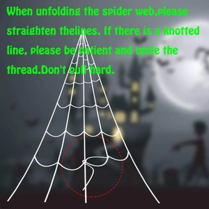 Large white Halloween spider web decoration with instructions on how to unfold it