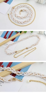 Close-up of elegant multilayer pearl waist chain with adjustable gold alloy lobster clasp