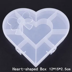 Clear heart-shaped plastic storage box with 8 compartments measuring 12x15x2.5cm