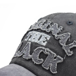 Distressed wash cotton baseball cap with The Black embroidery in vintage street style