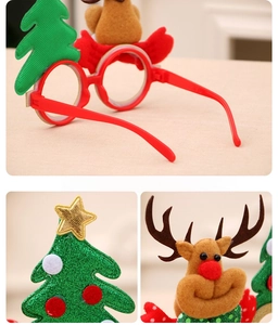 Macro detail of Christmas glasses featuring green glitter trees and plush reindeer antlers