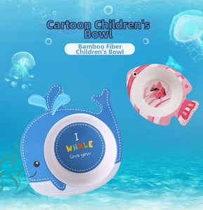 Detail of eco-friendly bamboo fiber bowls with whale and tropical fish cartoon designs