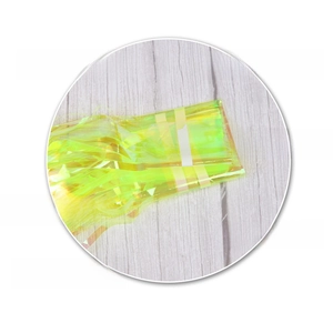 Detailed view of iridescent PET tinsel curtain with 6mm adhesive tape for easy installation
