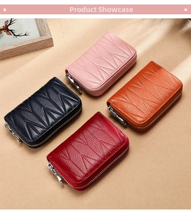 Portacarte in pelle con zip in rosa, blu navy, arancione e rosso con cuciture a vista