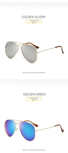 Classic aviator sunglasses with golden metal frames in silver and green mirror lenses