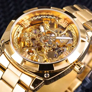 Detailed close-up of golden skeleton mechanical watch movement and metal strap