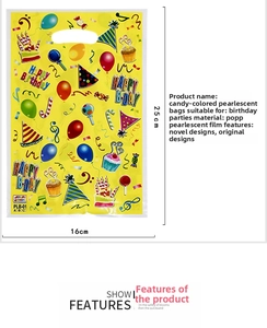 Detail view of yellow pearlescent gift bag with Happy Birthday balloon patterns