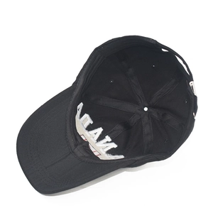 Detail view of cotton baseball cap interior showing embroidery stitching and seam quality