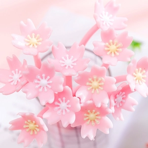 Set of pink cherry blossom silicone pens with soft grip and 0.5mm black ink for students