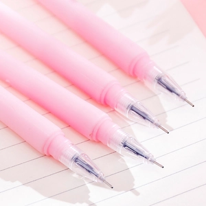 Pack of 4 pink cherry blossom gel pens with soft silicone grip on a notebook background