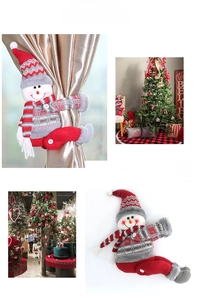 Detail of knitted snowman curtain buckle for festive window scene decorations