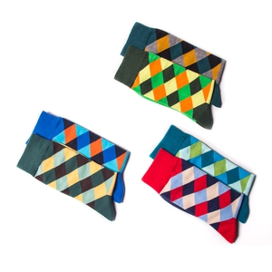 Texture détaillée du tricot de chaussettes en coton avec motif à losanges