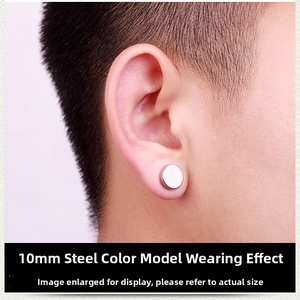 Close-up of 10mm silver magnetic stud earring in stainless steel on ear lobe