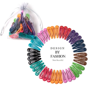 Colorful drip oil metal BB hair clips arranged in a circle with organza gift bag
