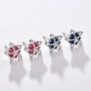Snowflake stud earrings featuring AAA zircon inlay in vibrant red and deep blue crystals