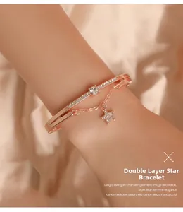 Nahaufnahme eines eleganten zweilagigen Sternarmbands aus Roségold mit Diamanten