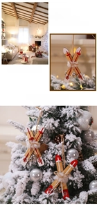 Detail view of a wooden Christmas ski pendant with red accents and hanging rope