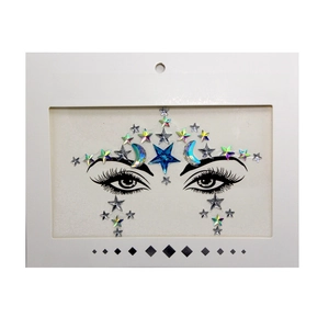 Detail view of blue star and moon face crystal stickers for masquerade makeup decor