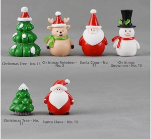 Detailed collection of mini resin Christmas figurines including Santa, reindeer, and snowman