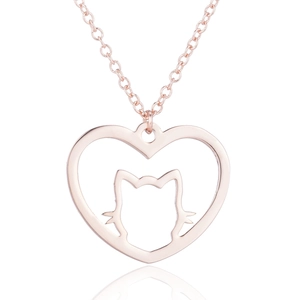 Close-up of rose gold stainless steel necklace with heart and cat silhouette pendant