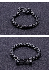 Detailed view of men's black stainless steel square link bracelet with dumbbell toggle clasp