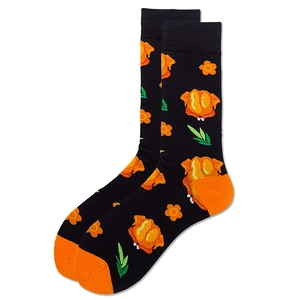 Detail of cotton mid-calf socks with turkey pattern and floral print on black fabric