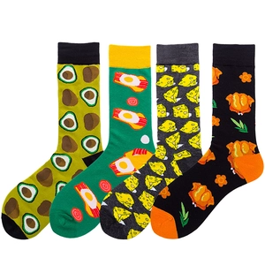 Detail view of cotton crew socks featuring fun avocado, bacon, cheese, and chicken patterns