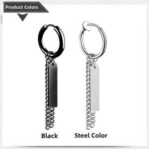 Detail view of steel and black tassel chain earrings with rectangular pendant tags