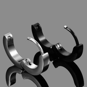 Minimalist stainless steel hoop earrings in silver and black with a mirror reflection