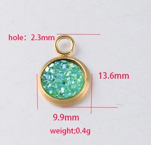 Detail of 10mm green resin pendant with dimensions 13.6x9.9mm and 2.3mm hole size