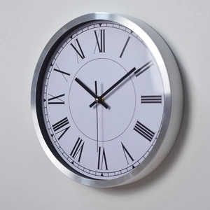12-inch stainless steel wall clock with silver brushed frame and Roman numerals