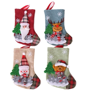 Set of 4 Christmas stockings with 3D Santa, reindeer, snowman and bear hanging decor