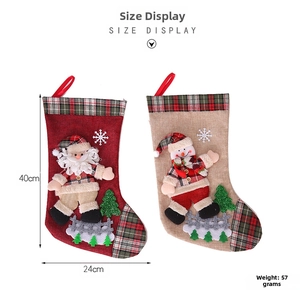 Detailed view of 40cm Christmas stockings with 3D Santa and Snowman figure ornaments