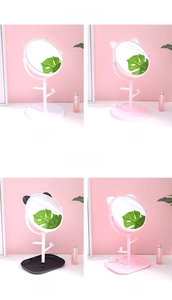 Detail of cat ear makeup mirrors with branch-shaped jewelry organizers and sturdy bases