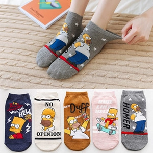 Detailed close-up of colorful cartoon cotton socks with vibrant Simpsons character prints