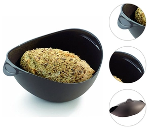 Macro detail of dark grey silicone bread maker showing texture, handle and closure mechanism