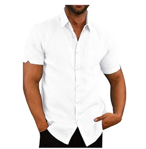 Detailed close-up of a white short-sleeve linen shirt featuring a collar and chest pocket