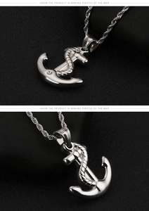 Close-up of retro stainless steel anchor pendant with rope detail on a twisted chain