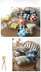 Close-up of assorted plaid linen pillow covers in various colors for home decor