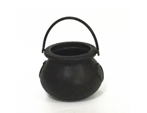 Close-up of a mini black Halloween witch cauldron with a handle on white background