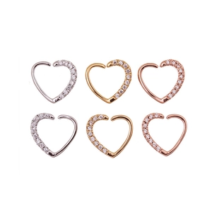 Set of six minimalist heart-shaped nose rings and earrings with micro-pave cubic zirconia