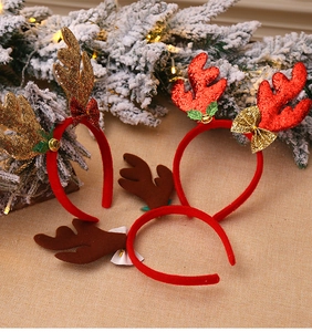 Close-up of glittery reindeer antlers headbands with bells for Christmas parties
