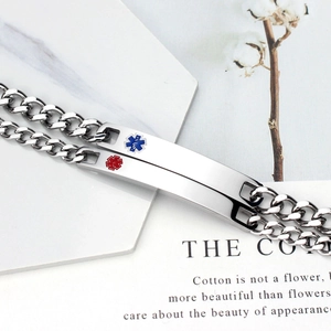 Detail view of stainless steel medical alert bracelets with blue and red Star of Life icons