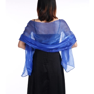 Detailed back view of a sheer blue shawl made of lightweight fabric for evening dresses