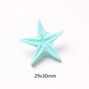 Detailed view of light blue resin starfish charm with white dot texture and 29x30mm dimensions