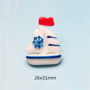 Macro view of white resin sailboat charm for DIY crafts, size 26x31mm with nautical details